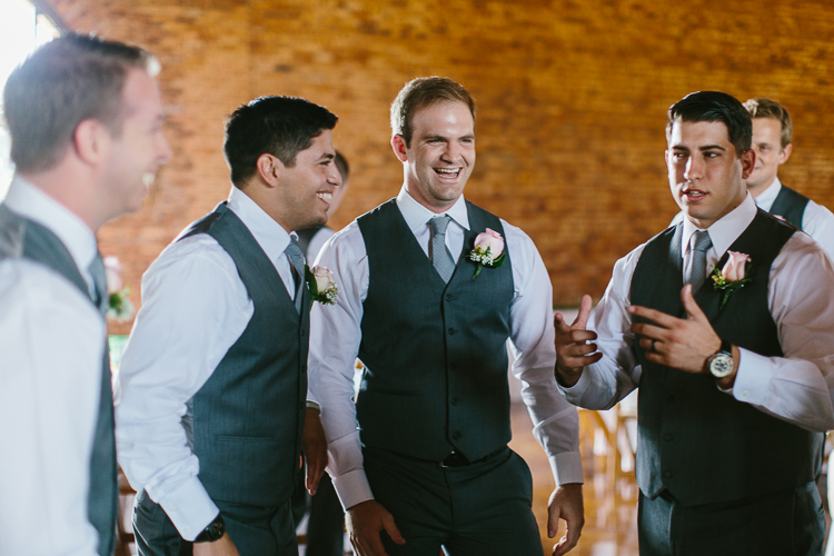 The Groomsmen Sharing Laughs