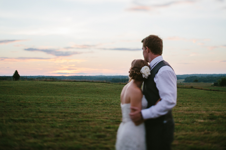 The Bride and Groom Admiring the Sunset