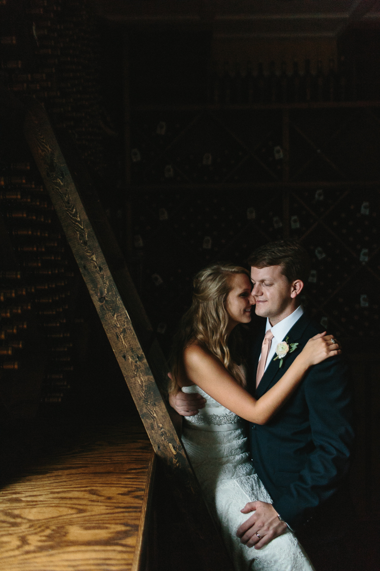 A Special Moment Between the Bride and Groom in the Wine Cellars