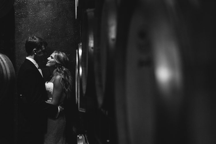 Black and White Portrait of the Bride and Groom in the Wine Cellars