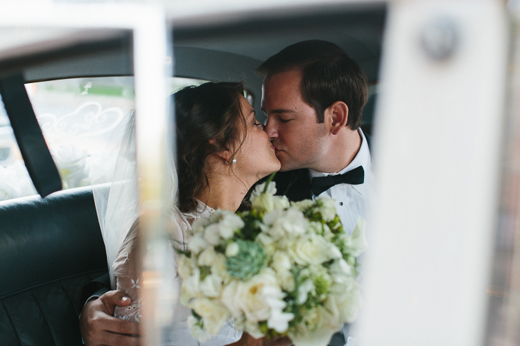 Bride and groom sharing a kiss