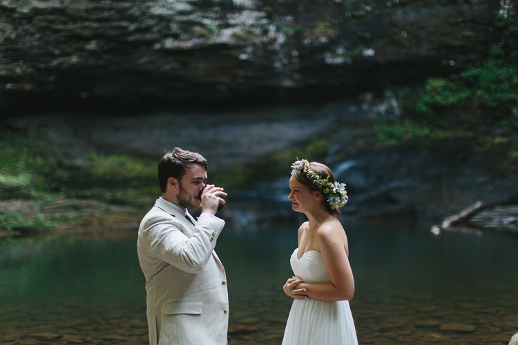 Bride and groom taking communion