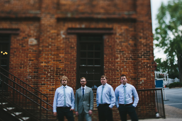 Urban groomsmen portrait