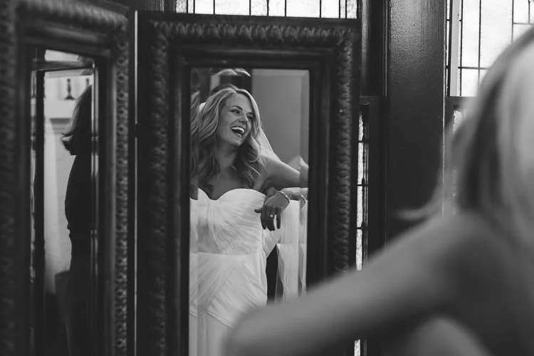 Happy bride getting ready
