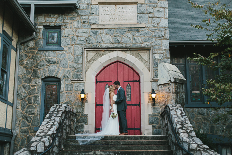 Bride and groom share a kiss