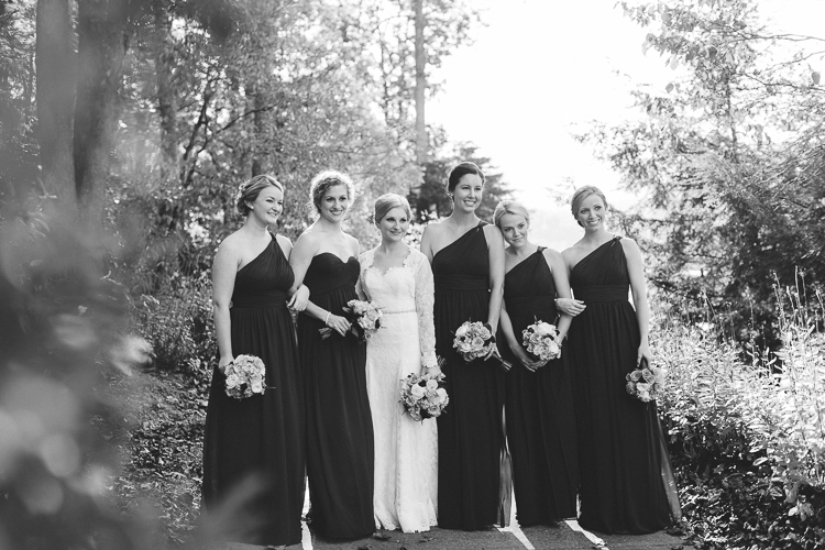 Black and white portrait of bride and her bridesmaids