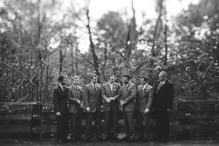 Black and white shot of groom and his groomsmen