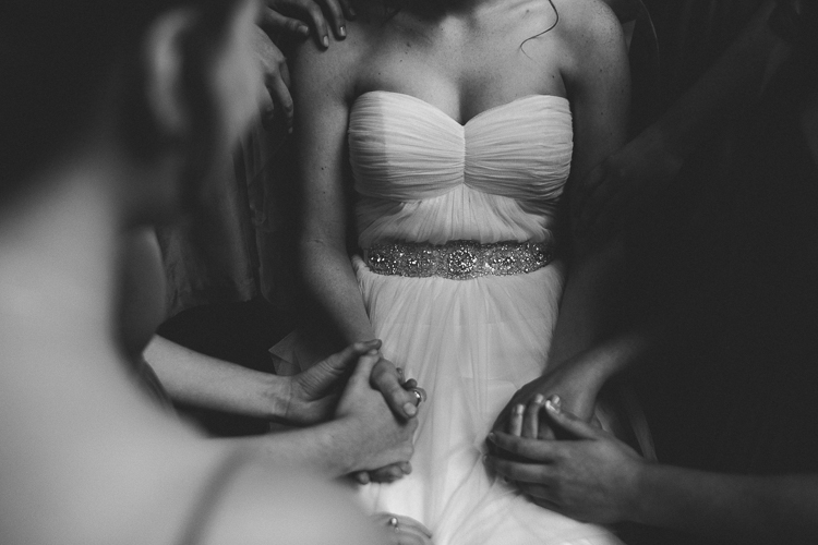 Praying over the bride