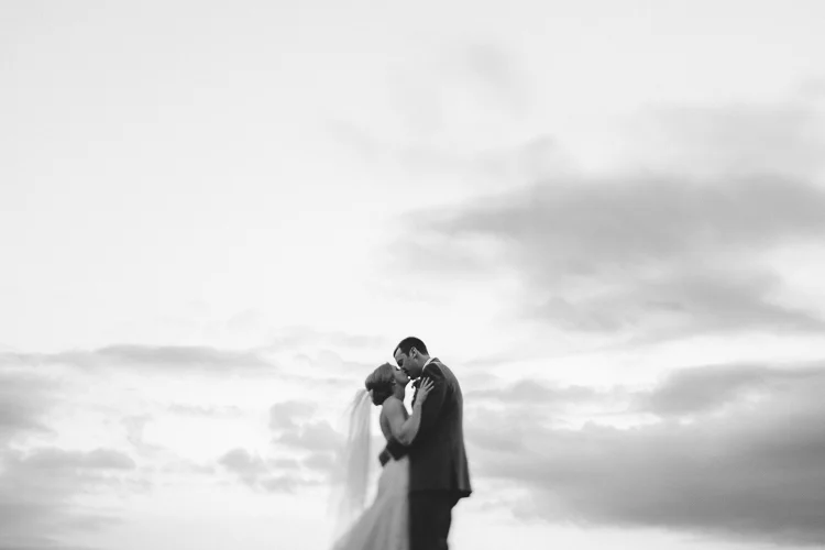 Black and portrait of bride and groom