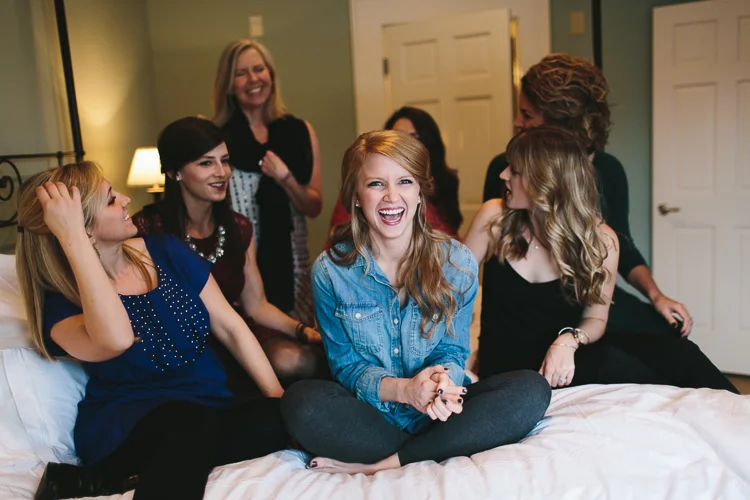 bride getting ready with her bridesmaids