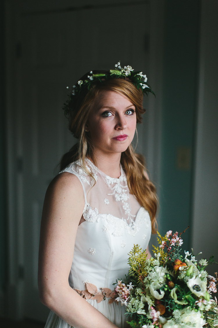 beautiful bohemian bride portrait with flower crown