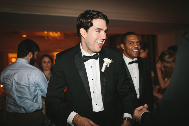 groom getting down on the dance floor