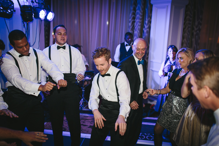 groomsmen dancing on the dance floor