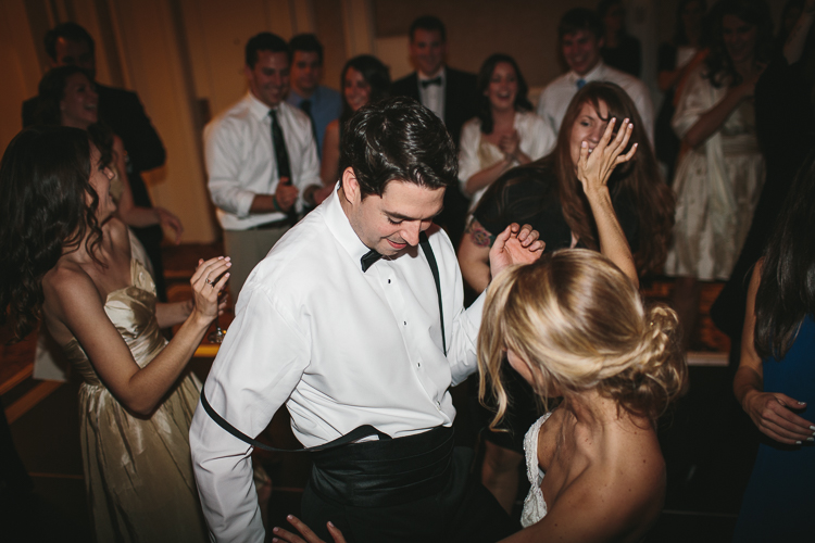 bride and groom getting down on the dance floor