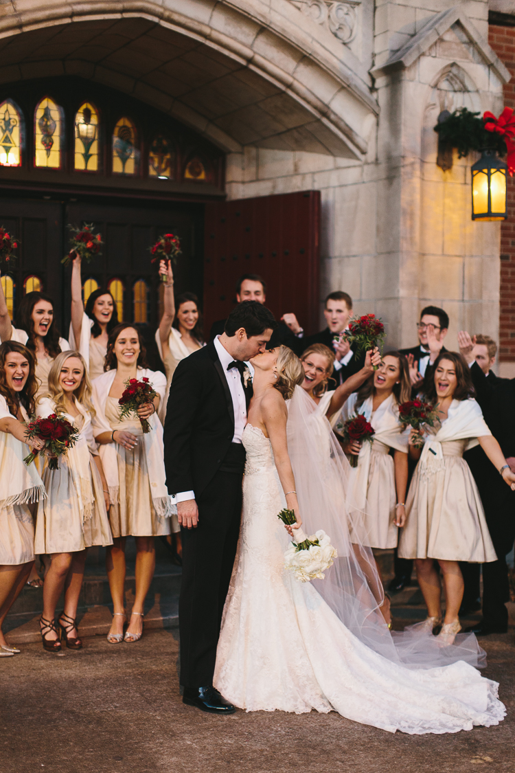 wedding party with bride and groom after the ceremony