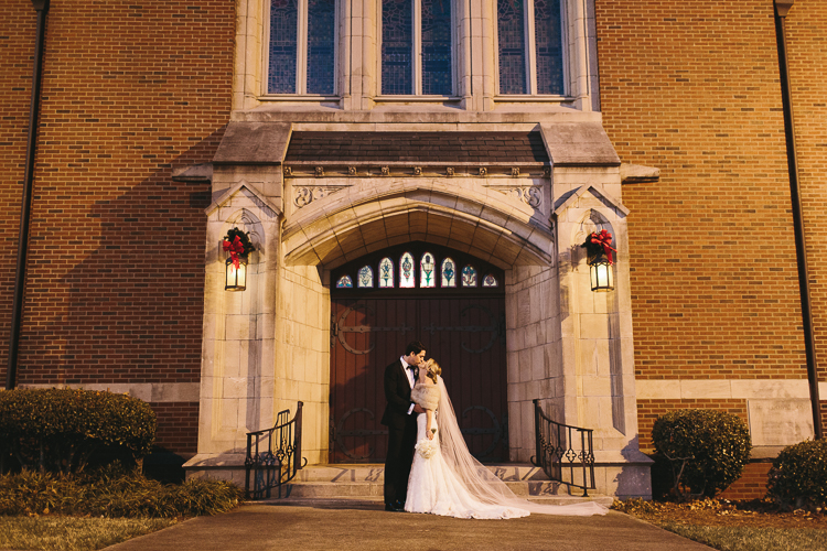 bride and groom sharing a kiss after their wedding