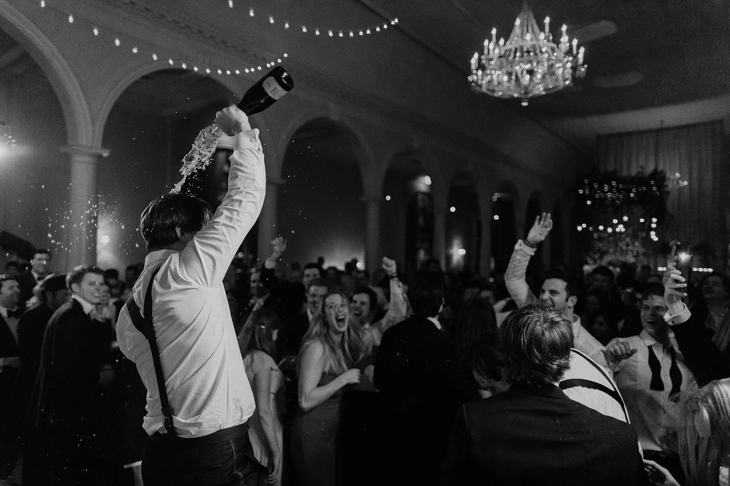 Groomsmen Pouring Champagne on his Head
