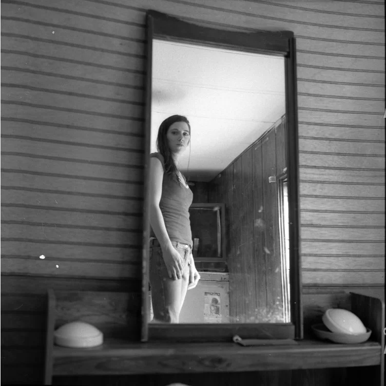  Cheryl in front of a TV birdcage 