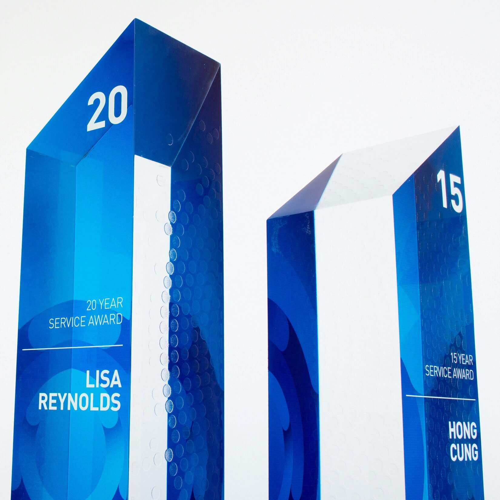 Custom designed and unique awards trophies for corporate employee service recognition. Long term service awards. 