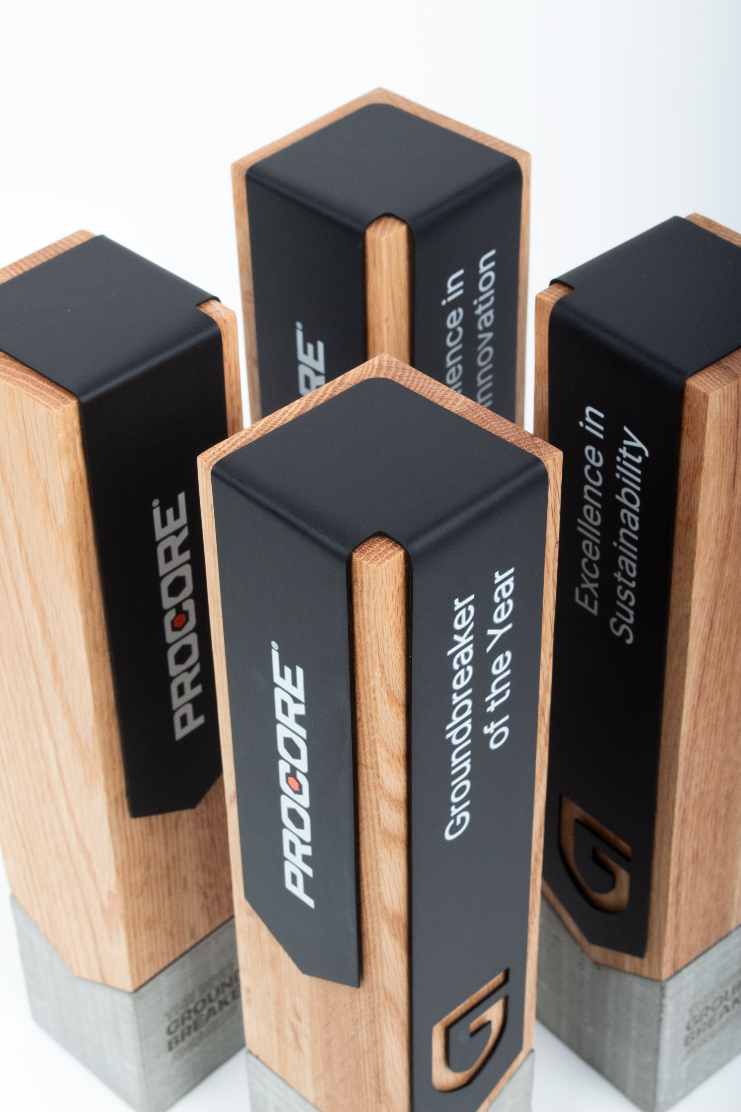 procore ground breaker custom concrete trophies wooden