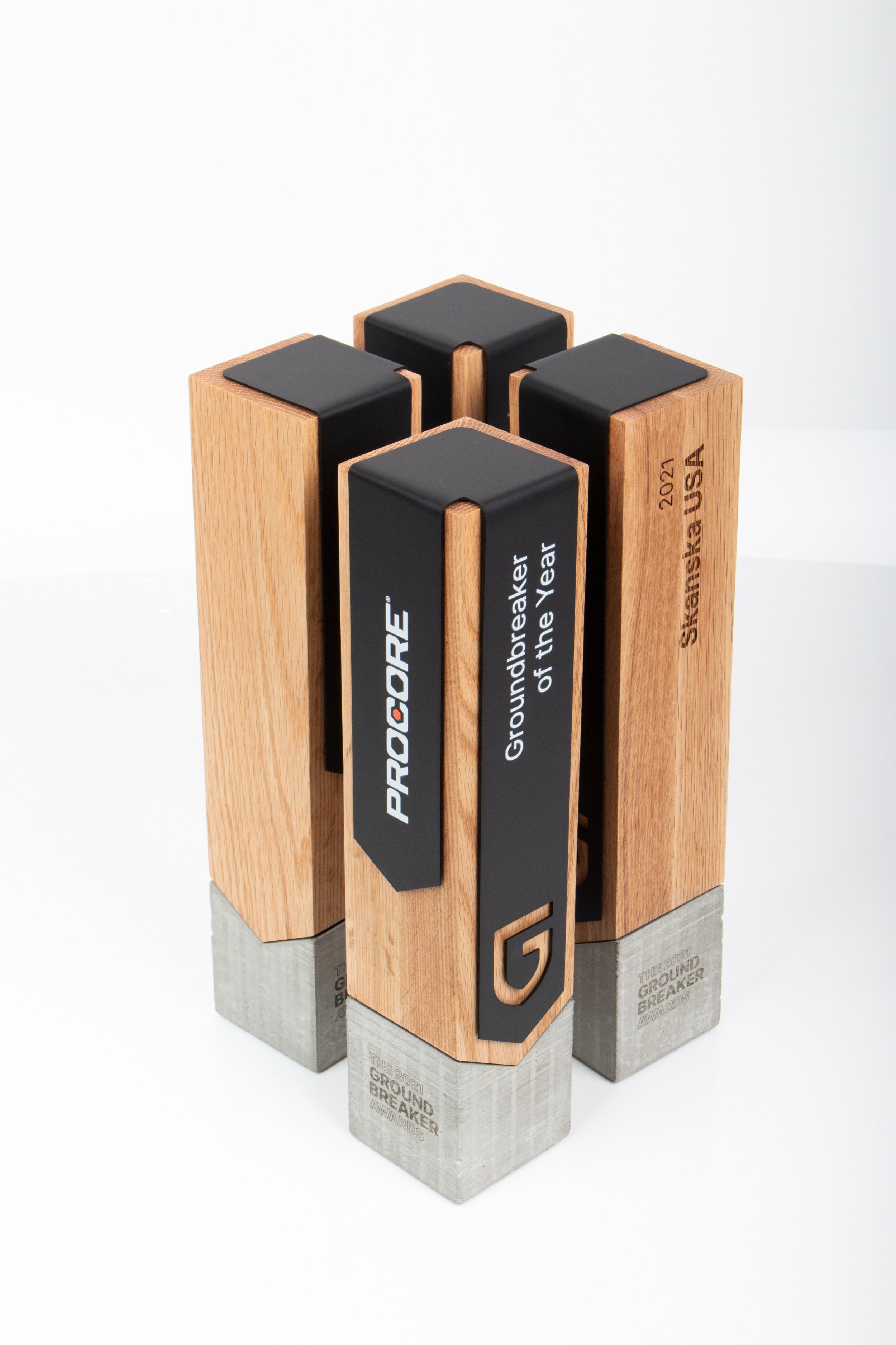 procore ground breaker custom concrete trophies wooden