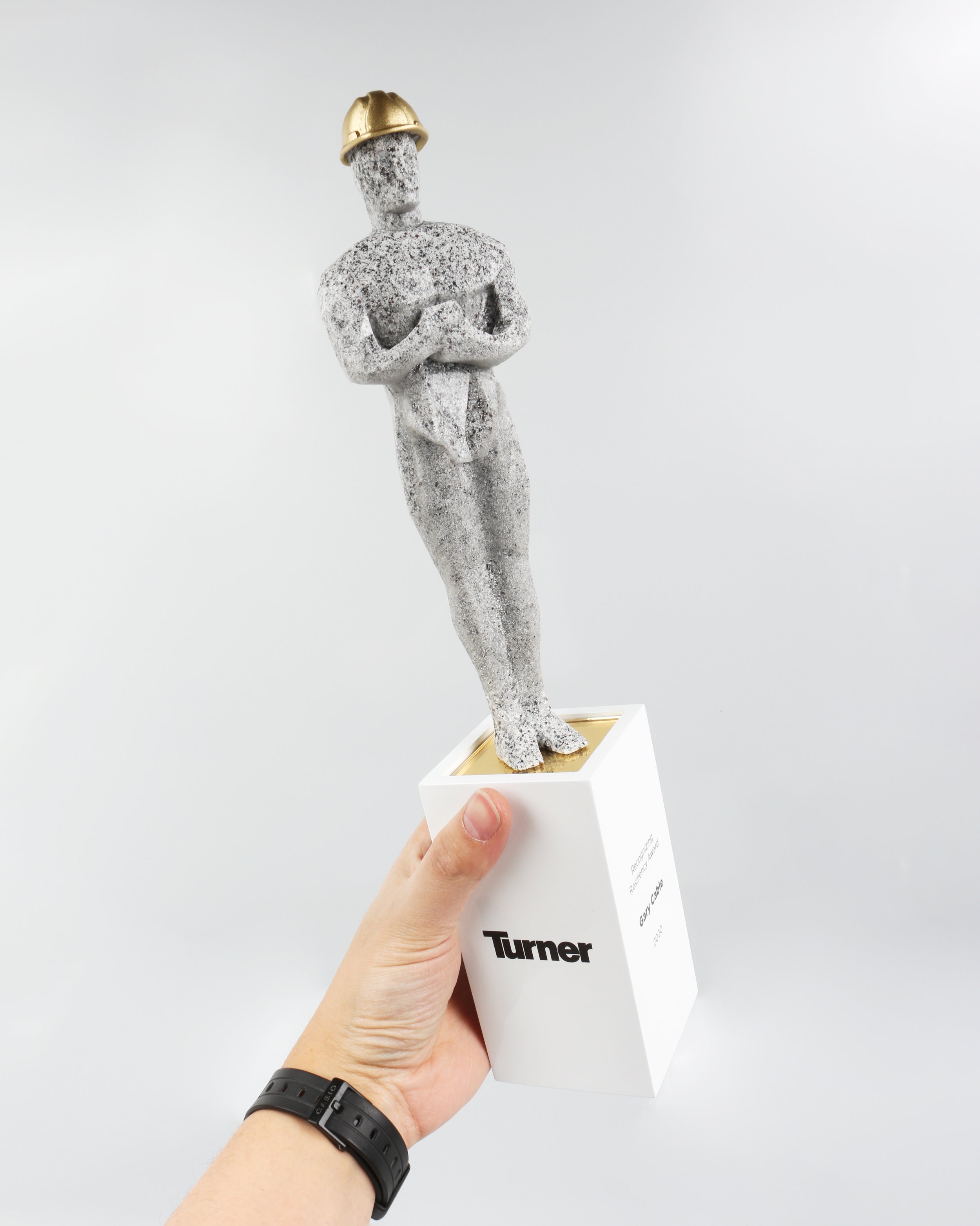 cast resin trophies and awards construction theme modern