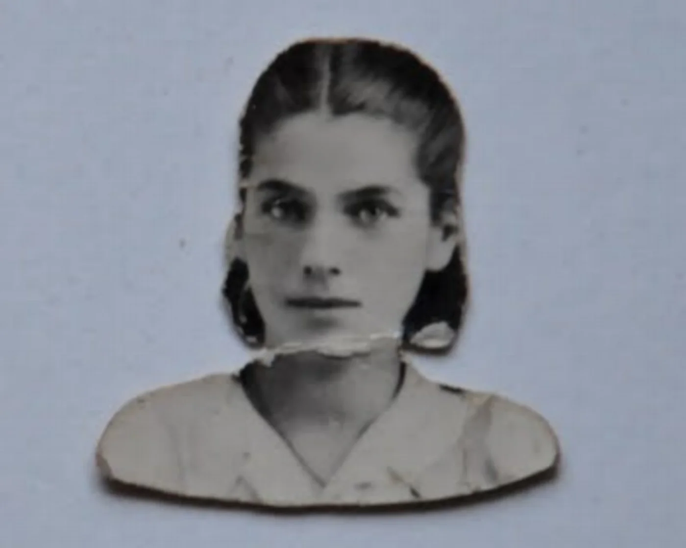 The photo of Sophia that Misha carried in his wallet, not knowing if she was alive, taken for her forged identity papers in the Warsaw ghetto.