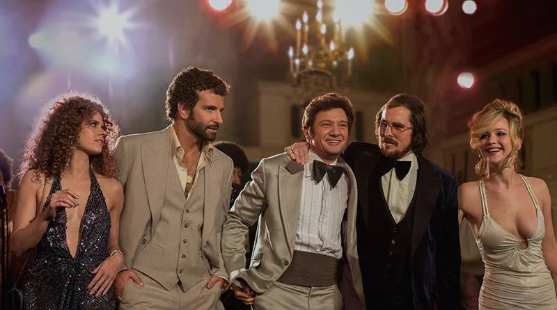 Amy Adams, Bradley Cooper, Jeremy Renner, Christian Bale and Jennifer Lawrence in American Hustle