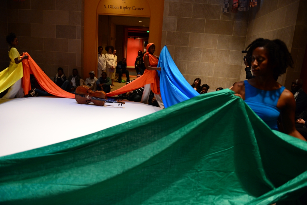   " Monument ," 2013. Photo documentation of live performance, Smithsonian National Museum of African Art. Photo credit: Rosina Photography.  