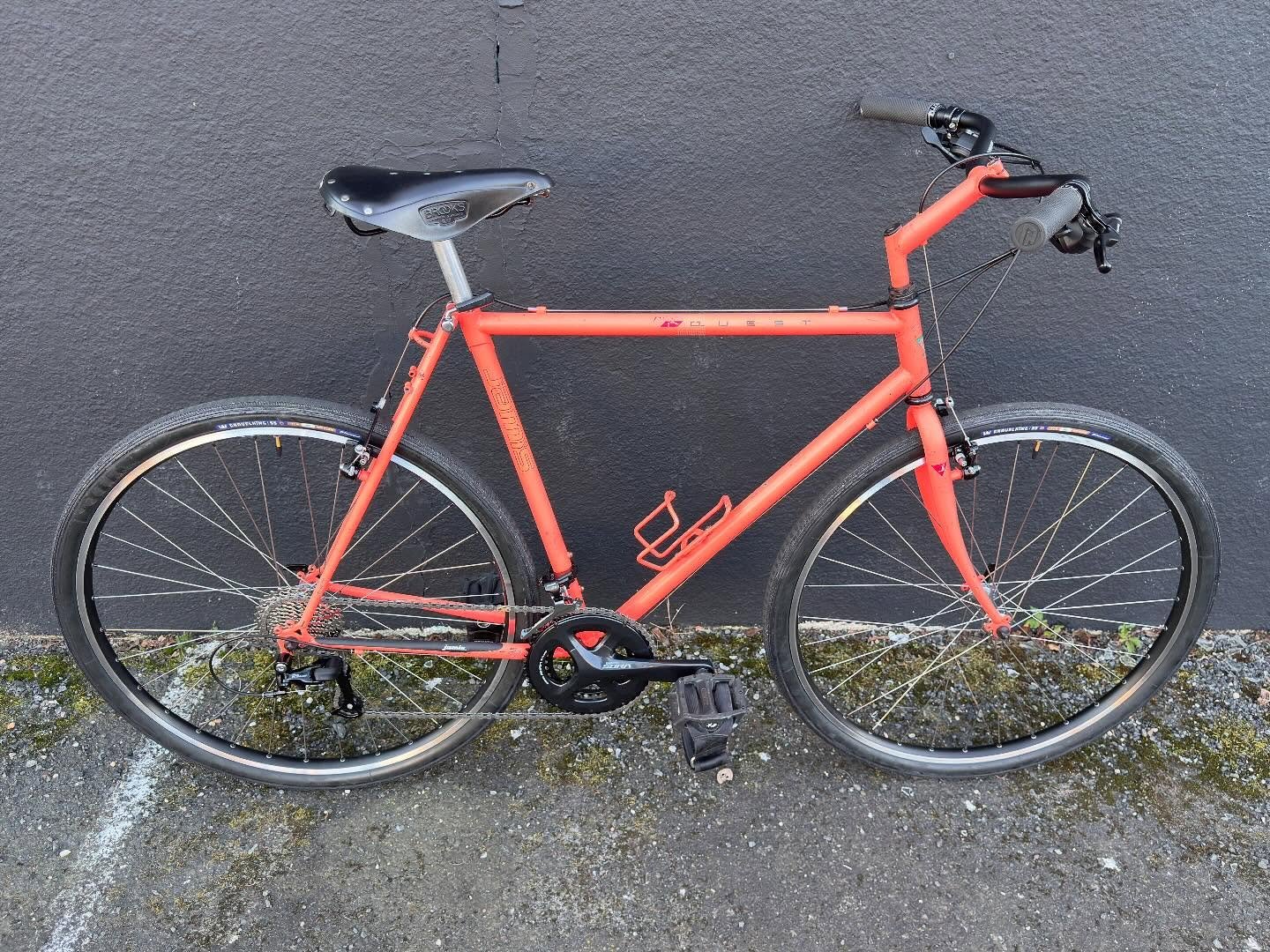 We love doing restomods on old classics.  This early 90&rsquo;s Jamis has been in a family for 2 generations since new. We increased the gear range in both directions with a new simpler 2x drivetrain, we laced some tubeless wheels and wrapped them in