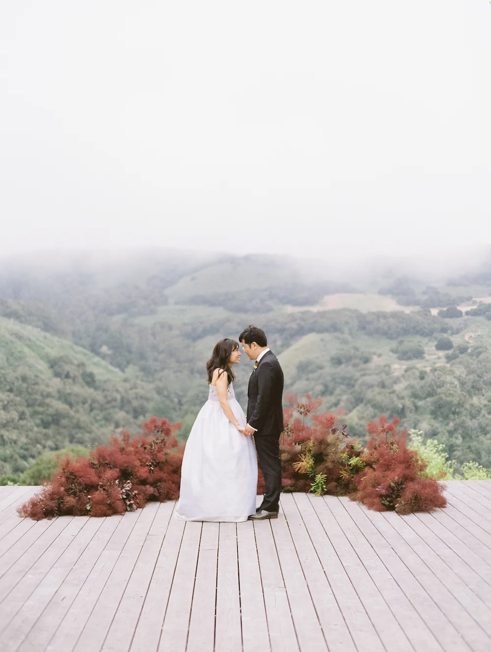 An altar installation of smokebush lined the lip of this hilltop platform overlooking Carmel Valley. Photo by Michele Beckwith.