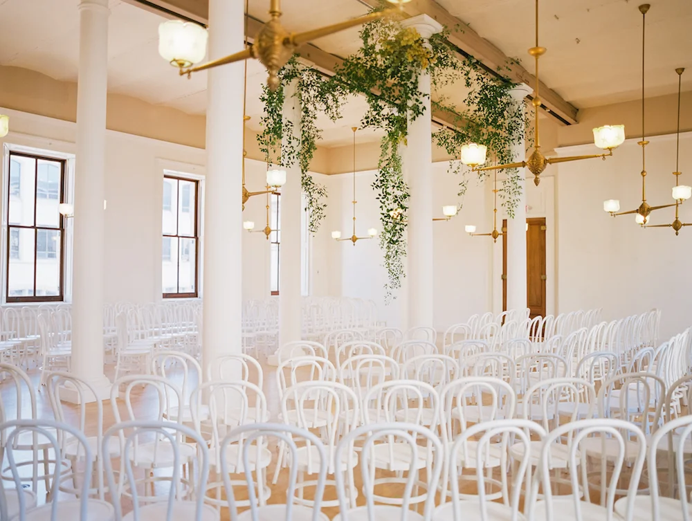 I lovingly refer to this ceremony set up as chuppah a la Jumanji. Photo by Michele Beckwith. Event Design by Bash Please.
