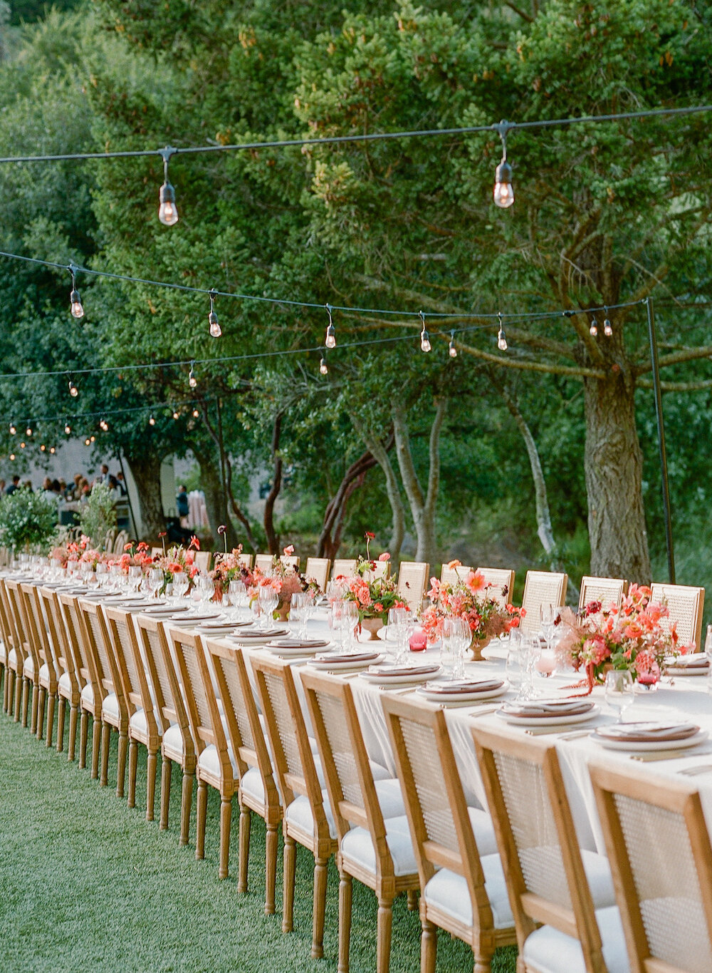  The most magical table, one infinite runway of flowers and a feast, surrounded on all sides by your nearest and dearest.   Photo by Rebecca Yale. Event Design by Callista &amp; Co. As seen on Martha Stewart Weddings. 