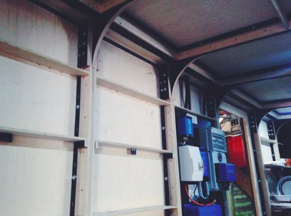 The interior walls are left exposed in this prototype, and are made from plywood.