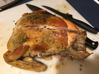 2. Allow to Cool. Let the bird rest at least until the legs are finished cooking. This will prevent the juices from leaving the bird, and will help keep the breast juicy. After at least 20 minutes, cut a straight line down the spine. You will be cutting one on each side. You will then move on to the wings to allow the breast to cool a bit.