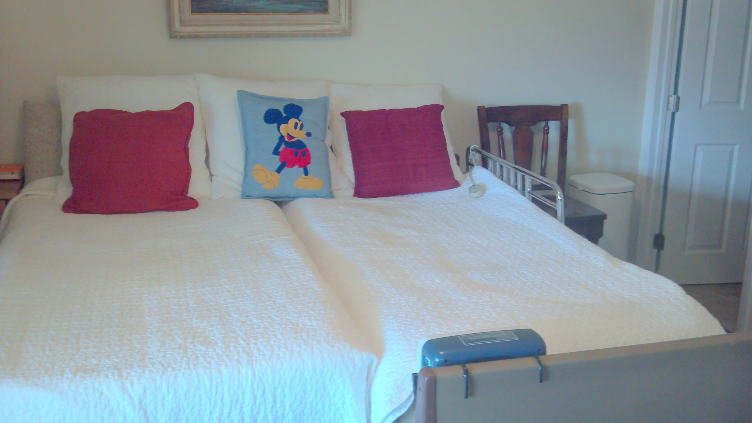 I still have a twin bed pushed up next to his. I'm resisting moving them apart. Love being near. 