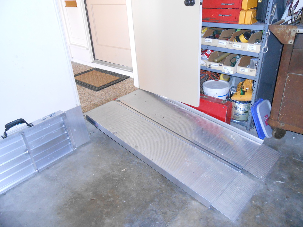 Ramps for wheelchair or walking.  (Note portable ramp at side. Handy when visiting others.)