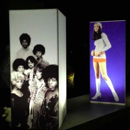 illuminated columns with 70's images 