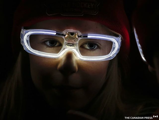 A young girl wears LED glasses while waiting for Prime Minister Justin Trudeau to arrive at the Wickenheiser World Female Hockey Festival in Calgary, Alta., Thursday, Nov. 22, 2018.THE CANADIAN PRESS/Jeff McIntosh
.
.
.
.
.
#yyc #eyes #LED #Calgary #ctwickfest @wickfest #WickFest2018 #WickFest #HockeyLife #HockeyMom #Hockeymoms #hockeycalgary #yychockey #winsport @hchickwick