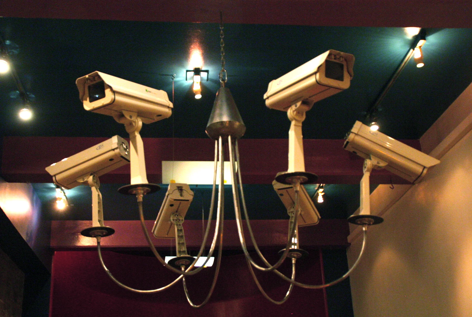   the great   5ft by 4ft by 6ft  cold rolled steel, surveillance camera hubs.  2013  The great was installed in the Pratt Chapel. Hanging in the center of the room looking down on the viewers seated below on the chapel benches. 