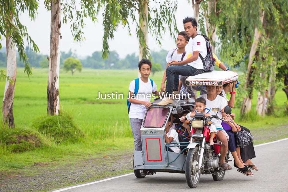 Over-Loaded Tricycle, Mangatarem, Pangasinan, Philippines Philippine Image # 4018 If you wish to purchase a photography print of this image, or would like to license this image please contact us using the form below. Please kindly include the Image Title and Image Ref # in your message, we will get back to you.
