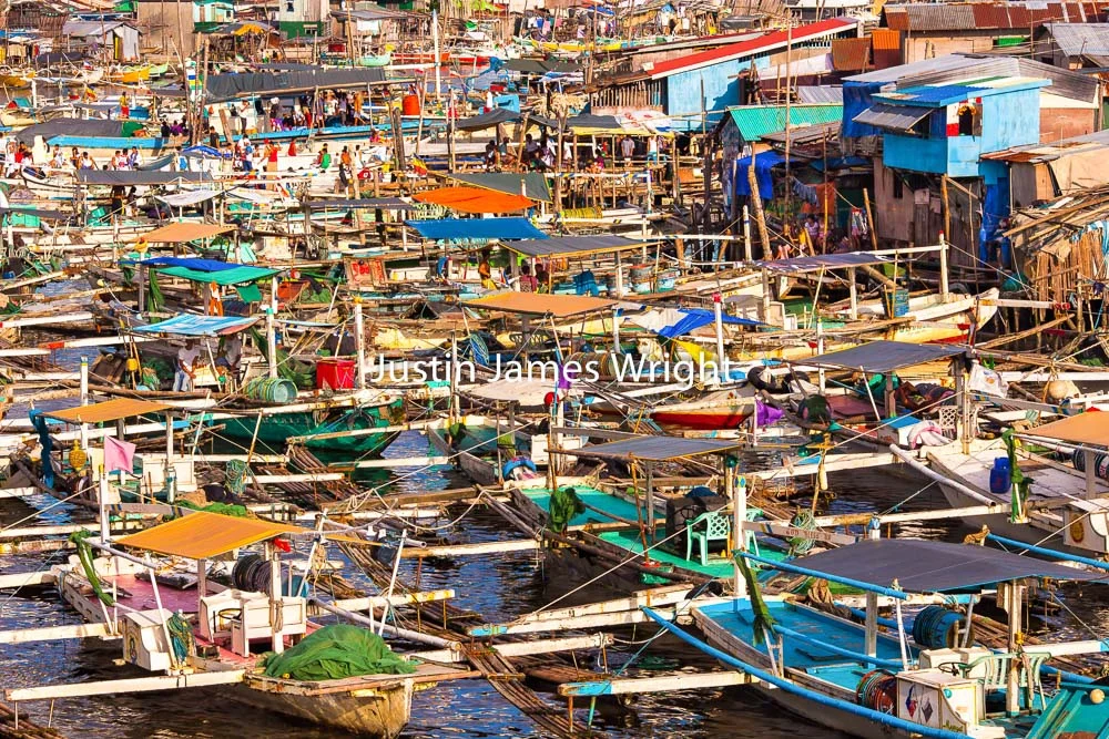Fishing Boats (Bancas), Navotas, Metro Manila, Philippines Philippine Image # 4030 If you wish to purchase a photography print of this image, or would like to license this image please contact us using the form below. Please kindly include the Image Title and Image Ref # in your message, we will get back to you.