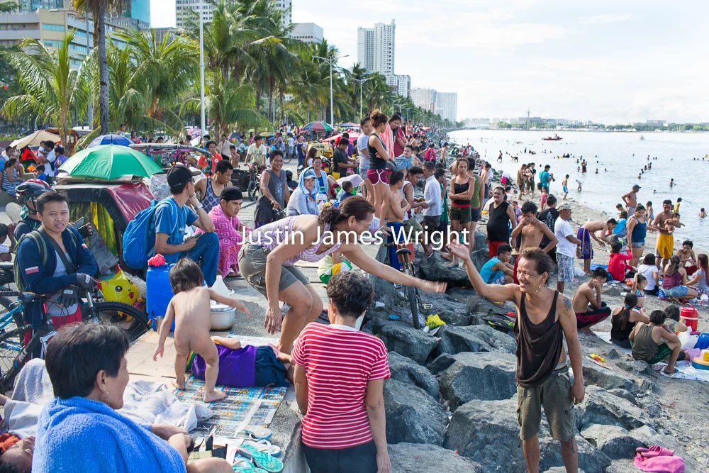 Easter Sunday Celebrations by the Bay, City of Manila, Philippines Philippine Image # 4125 If you wish to purchase a photography print of this image, or would like to license this image please contact us using the form below. Please kindly include the Image Title and Image Ref # in your message, we will get back to you.