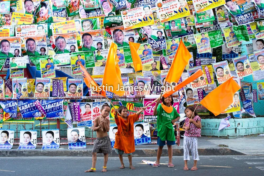 Election Posters, Manila, Philippines Philippine Image: 4066 If you wish to purchase a photography print of this image, or would like to license this image please contact us using the form below. Please kindly include the Image Title and Image Ref # in your message, we will get back to you.