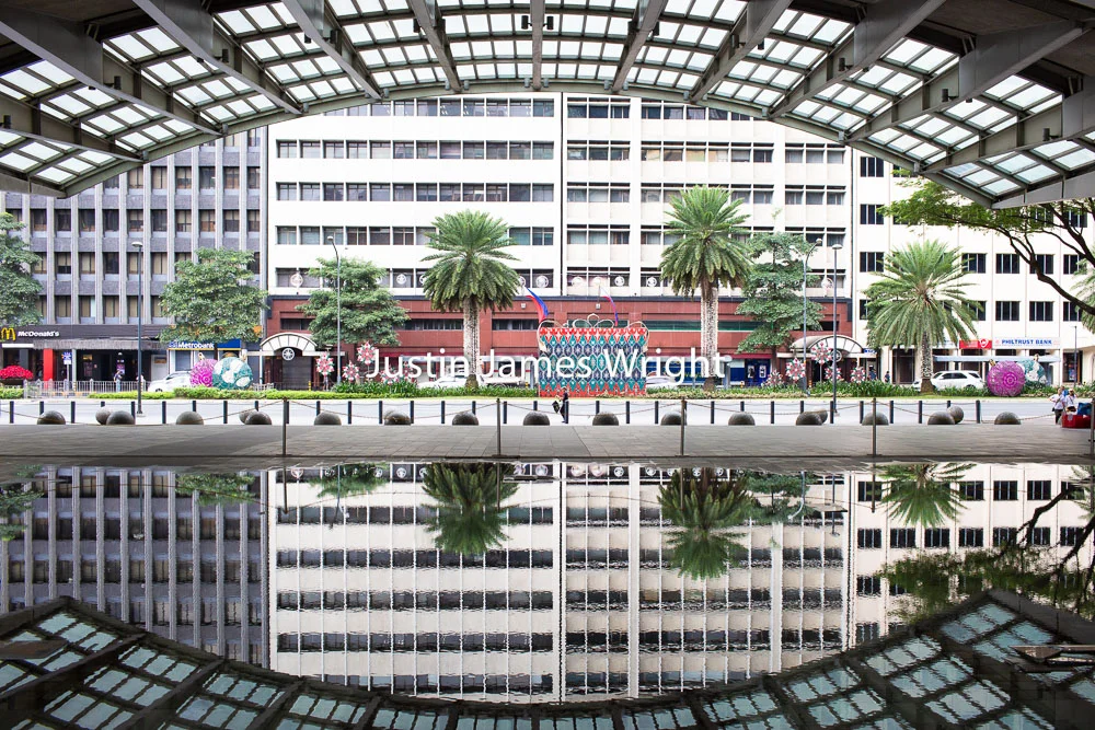 Title: Reflections, Ayala Triangle, Makati City, Metro Manila, Philippines Philippine Image # 4146 If you wish to purchase a photography print of this image, or would like to license this image please contact us using the form below. Please kindly include the Image Title and Image Ref # in your message, we will get back to you.