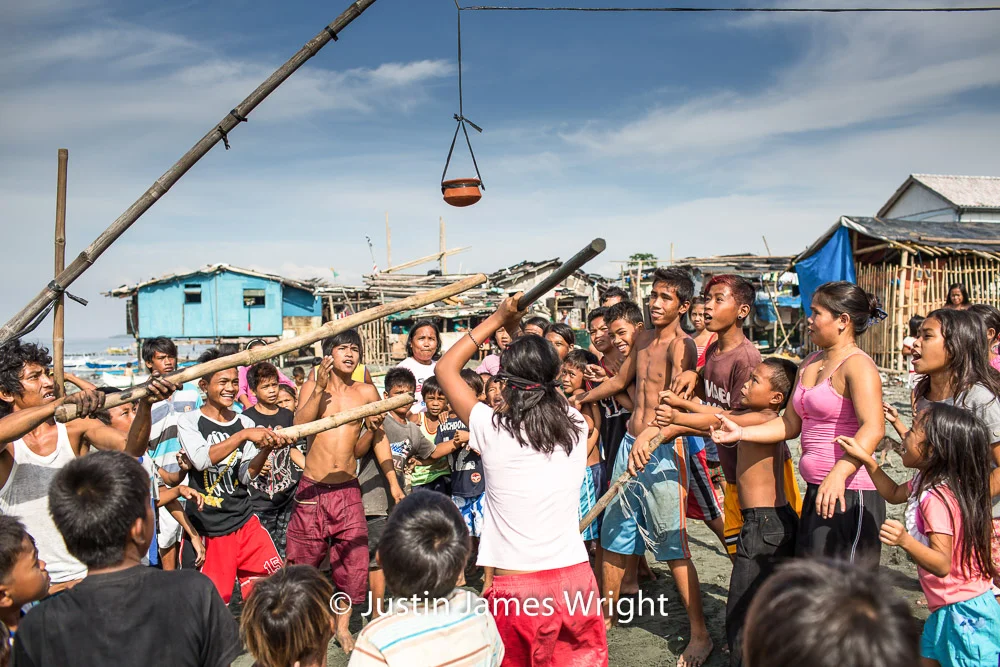 Basagang Palayok (Breaking the Pot), Isla Pulo, Navotas, Metro Manila, Philippines. Philippine Photo # 4203 If you wish to purchase a photography print of this image, or would like to license this image please contact us using the form below. Please kindly include the Image Title and Image Ref # in your message, we will get back to you.
