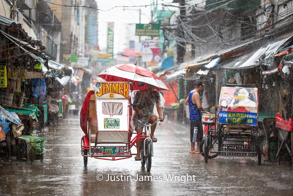 Manila Street Scene, Malibay, Pasay City, Metro Manila, Philippines. Philippine Photo 5275 If you wish to purchase a photography print of this image, or would like to license this image please contact us using the form below. Please kindly include the Image Title and Image Ref # in your message, we will get back to you.