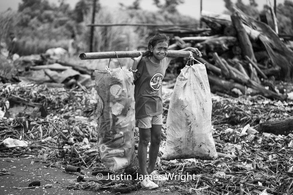 Resilience - The Isla Pulo Community, Philippines. September 2013. Canon EOS Mk III, EF 100 mm, F 2.8, 1/1600 sec.