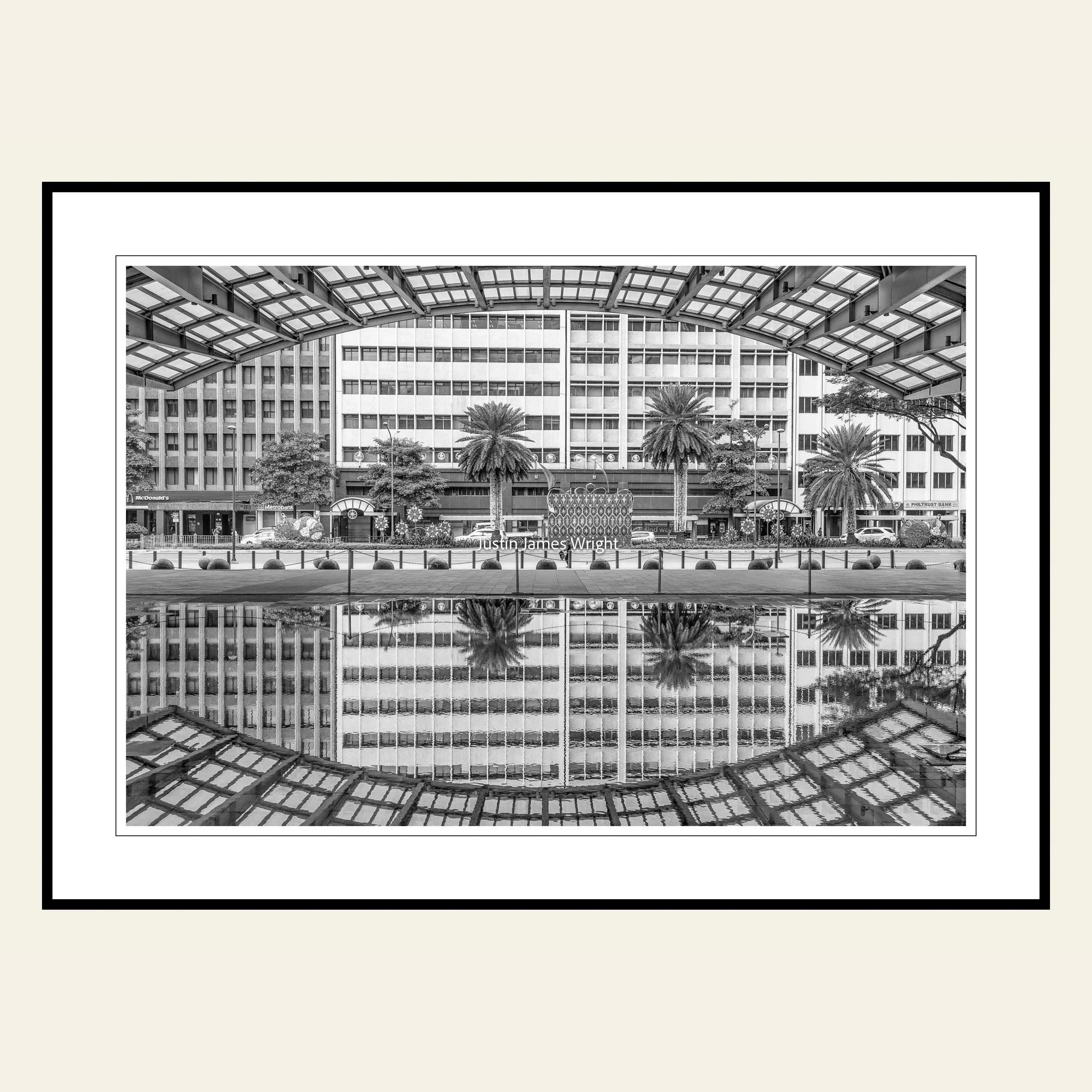 A black and white photography print featuring the Ayala Triangle Building in the City of Makati, Philippines.