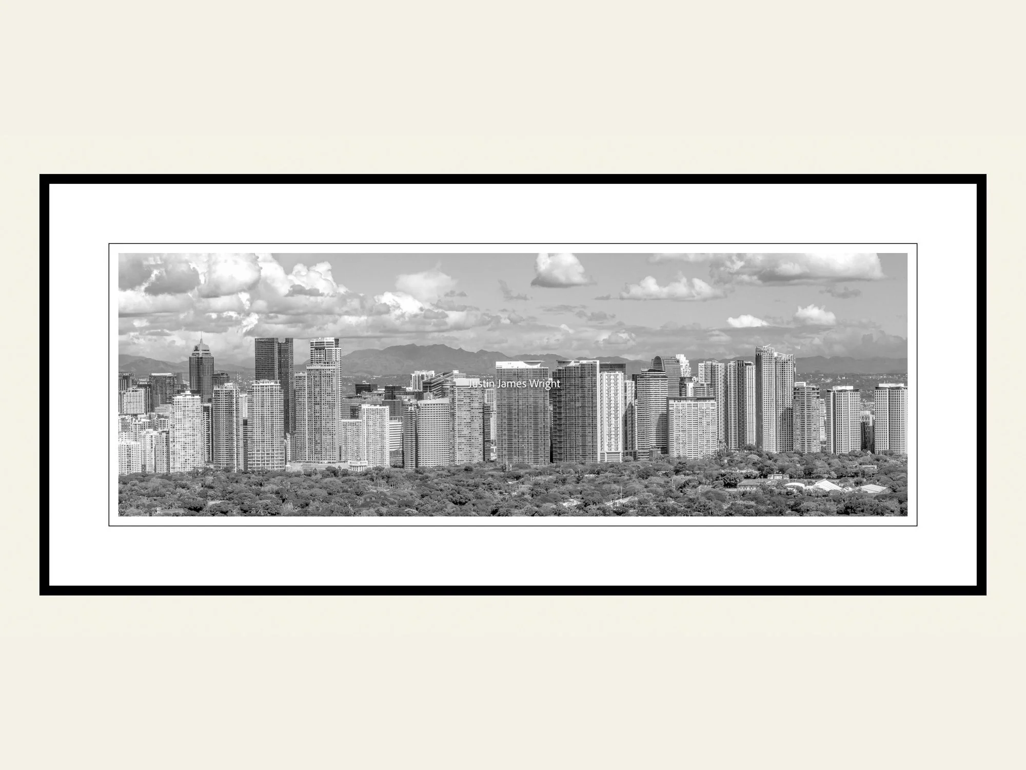 A framed black and white photography print of the skyline of Bonifacio Global City, Philippines.